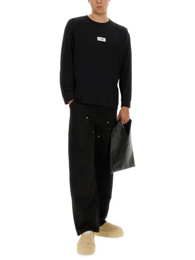 Mm6 Maison Margiela Black Jeans With Multi-pocket Design And Silver Rivets In Black