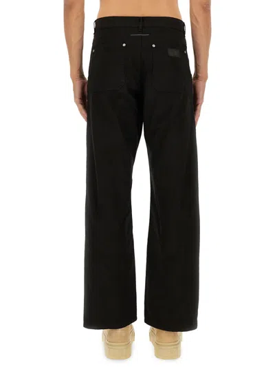 Mm6 Maison Margiela Black Jeans With Multi-pocket Design And Silver Rivets In Black