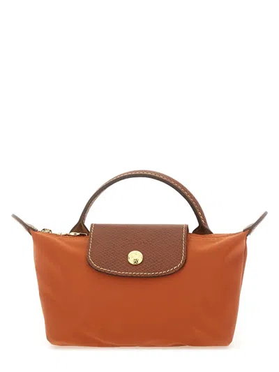 Longchamp Le Pliage Clutch Bag With Handle In Orange