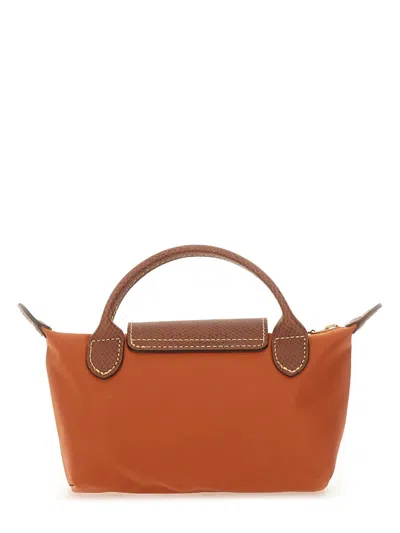 Longchamp Le Pliage Clutch Bag With Handle In Orange