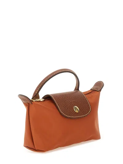 Longchamp Le Pliage Clutch Bag With Handle In Orange