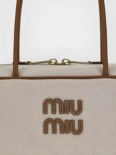 Miu Miu Crafted Canvas And Leather Shoulder Bag In Gray