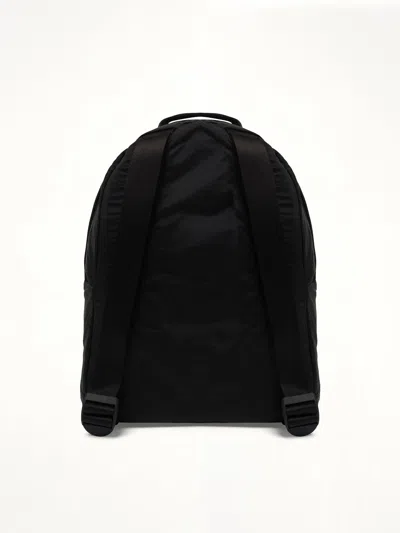 Stone Island Adjustable Strap Logo Backpack With Multiple Pockets In Black