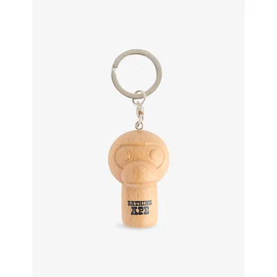 A Bathing Ape Mens Beige Doll Wood Key Ring In Brown
