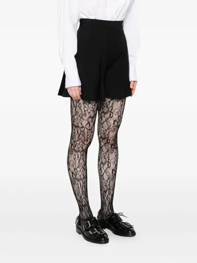 Alexander Mcqueen Pleated Tailored Shorts In Black