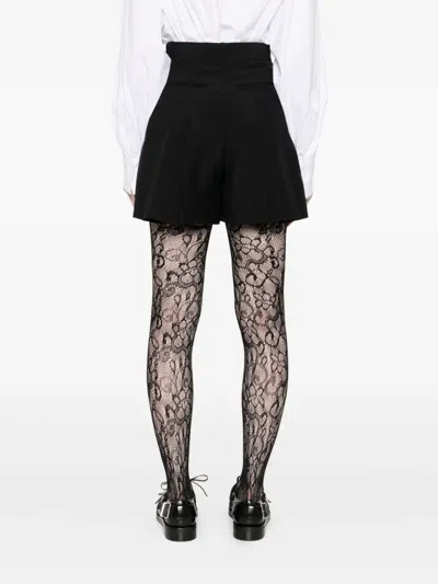 Alexander Mcqueen Pleated Tailored Shorts In Black