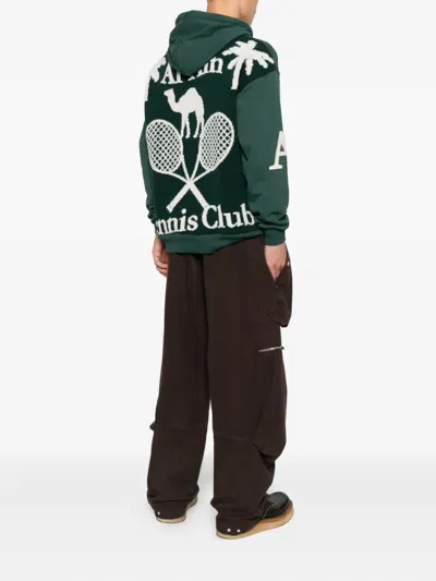 Al Ain Loose Fit Hoodie With Braided Drawstrings And Bold Graphics In Green