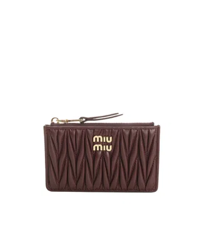 Miu Miu Quilted Zip Wallet In Brown