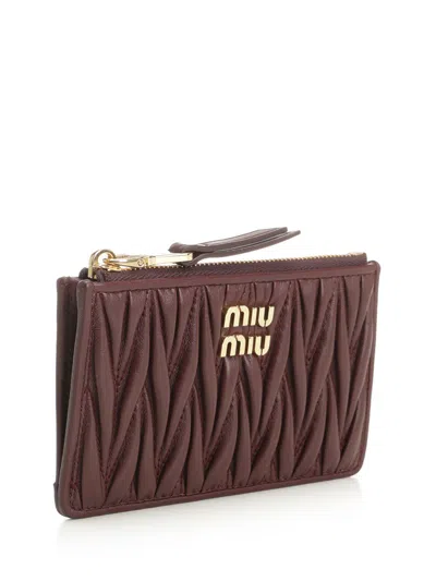 Miu Miu Quilted Zip Wallet In Brown