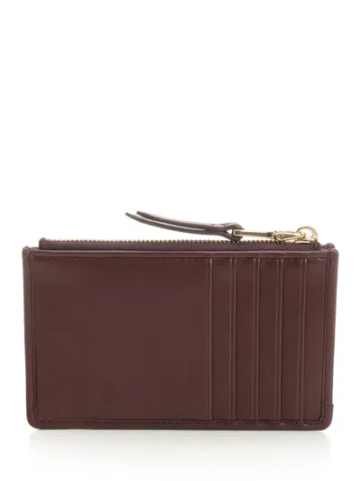 Miu Miu Quilted Zip Wallet In Brown