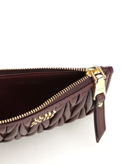 Miu Miu Quilted Zip Wallet In Brown