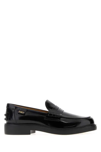 Tod's Mustard Gomma 20l Moccasins With Grommet-accented Heel In Black