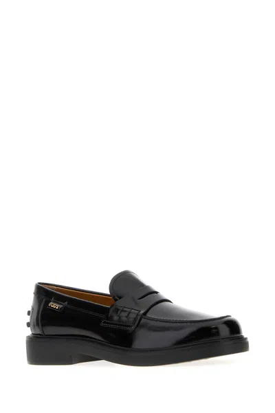 Tod's Mustard Gomma 20l Moccasins With Grommet-accented Heel In Black