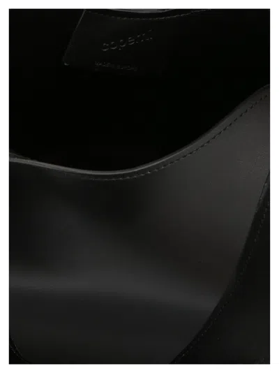 Coperni Baby Heart Leather Crossbody Bag In Black