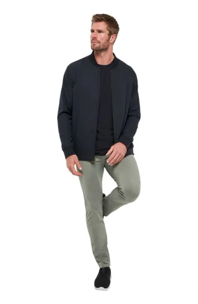 Travismathew Open To Close Performance Pants In Green