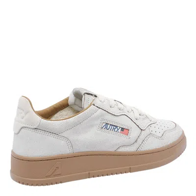Autry Low Top Leather Sneakers With Perforated Round Toe In White