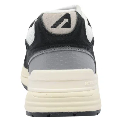Autry Leather And Fabric Sneakers In Black