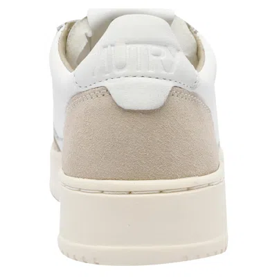 Autry Low-top Sneakers With Hybrid Leather Design And Metallic Accent In Sand