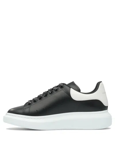 Alexander Mcqueen Black Low Top Sneakers With Chunky Sole And Contrasting Heel In Leather Man In Black