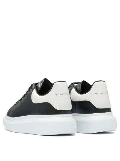 Alexander Mcqueen Black Low Top Sneakers With Chunky Sole And Contrasting Heel In Leather Man In Black