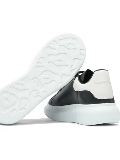 Alexander Mcqueen Black Low Top Sneakers With Chunky Sole And Contrasting Heel In Leather Man In Black