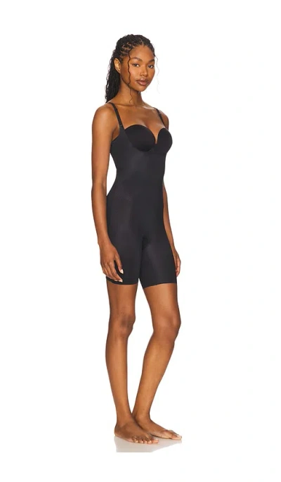 Spanx Shape Invisible Shaping Open-bust Mid-thigh Bodysuit In Black