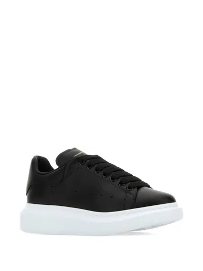 Alexander Mcqueen Black Low Top Sneakers With Logo Lettering On Tongue And Heel In Leather Woman In Black