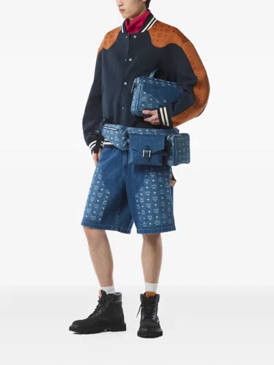 Mcm Large Aren Monogram-jacquard Denim Multi-backpack In Blue