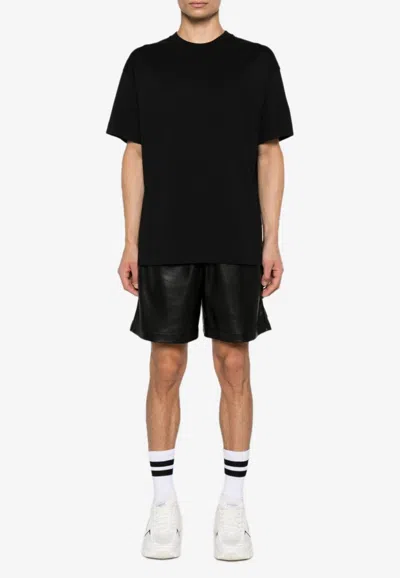 Givenchy Logo Embossed T-shirt In Black