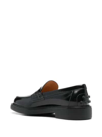 Tod's Mustard Gomma 20l Moccasins With Grommet-accented Heel In Black