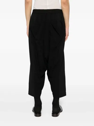 Devoa Water-repellent Trousers In Black
