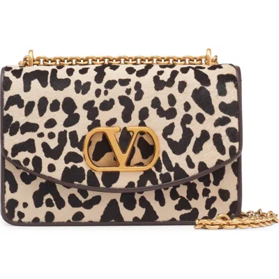 Valentino Garavani Vain Small Cow-print Leather And Calf-hair Shoulder Bag In Animal Print