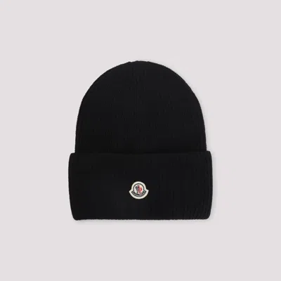 Moncler Ribbed Knit Carded Wool Beanie With Felt Logo Patch In Black