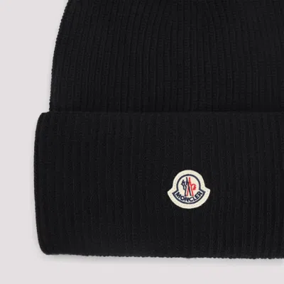 Moncler Ribbed Knit Carded Wool Beanie With Felt Logo Patch In Black