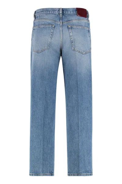 Gucci Blue Jeans With Logo Patch On The Rear And Faded Effect In Denim Woman