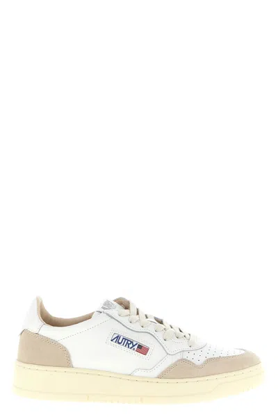 Autry Low-top Sneakers With Hybrid Leather Design And Metallic Accent In Sand