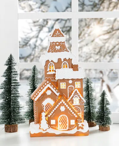 Glitzhome 17.75" Lighted Resin Christmas Gingerbread House Figurine In Multi