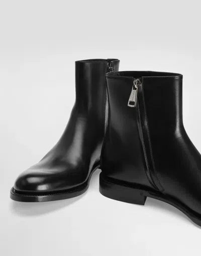 Dolce & Gabbana Zippered Leather Ankle Boots In Black