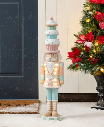 Glitzhome 28" Lighted Macaron Resin Christmas Cupcake Nutcracker Porch Decor In Multi