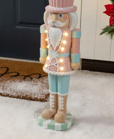 Glitzhome 28" Lighted Macaron Resin Christmas Cupcake Nutcracker Porch Decor In Multi