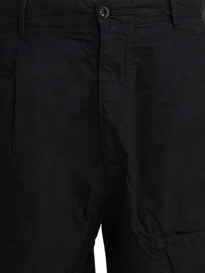 C.p. Company Trousers Featuring Various Functional Pockets In Black