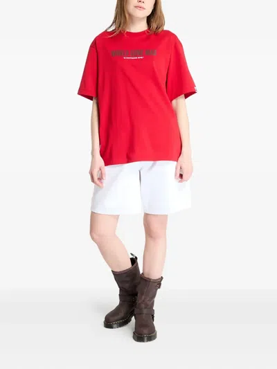 A Bathing Ape Slogan Graphic Tee In Red