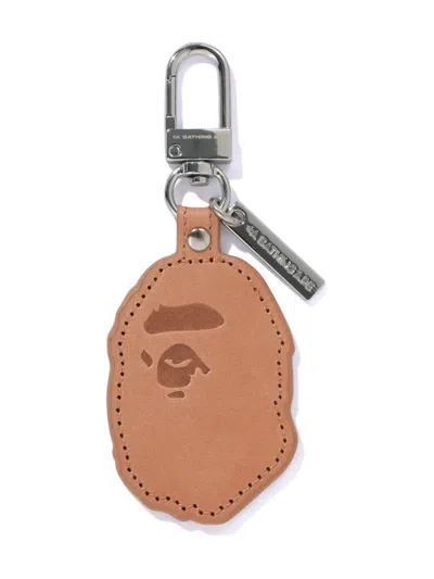 A Bathing Ape Ape Head Leather Keyring In Metallic