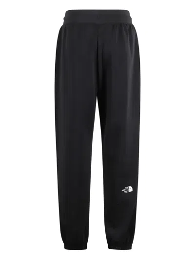The North Face Womens Essential Relaxed Brand-embroidery Cotton-blend Jogging Bottoms Black In Black