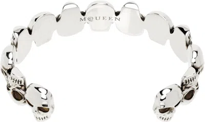 Alexander Mcqueen Multi-skull Cuff Bracelet In Metallic