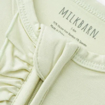 Milkbarn Luxe Solid Ruffle Footed Romper In Green