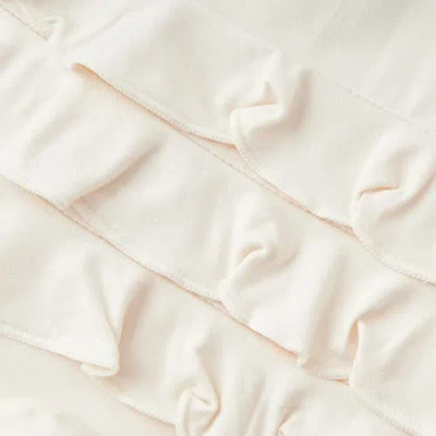 Milkbarn Luxe Solid Ruffle Footed Romper In White