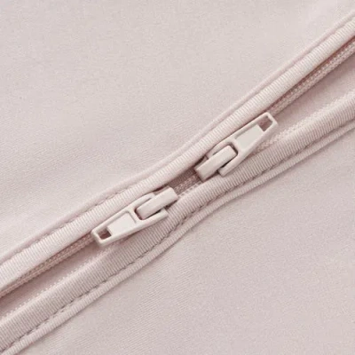 Milkbarn Luxe Solid Zipper Footed Romper In Pink