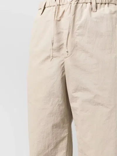 Nanushka Relaxed Fit Trousers With Elastic Waistband And Textured Fabric In Neutral