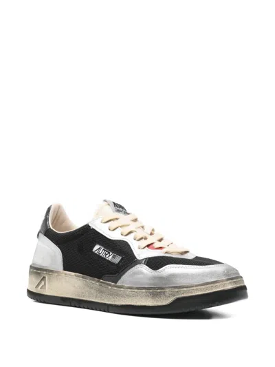 Autry Leather Low Top Sneakers With Laminated Inserts In Black